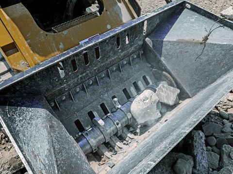 close up of inside a crusher bucket