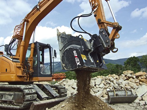 crusher bucket shifting dirt on the end of an excavator