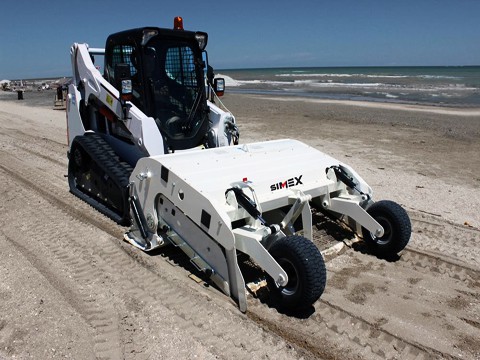 full view of a beach cleaner on a beach